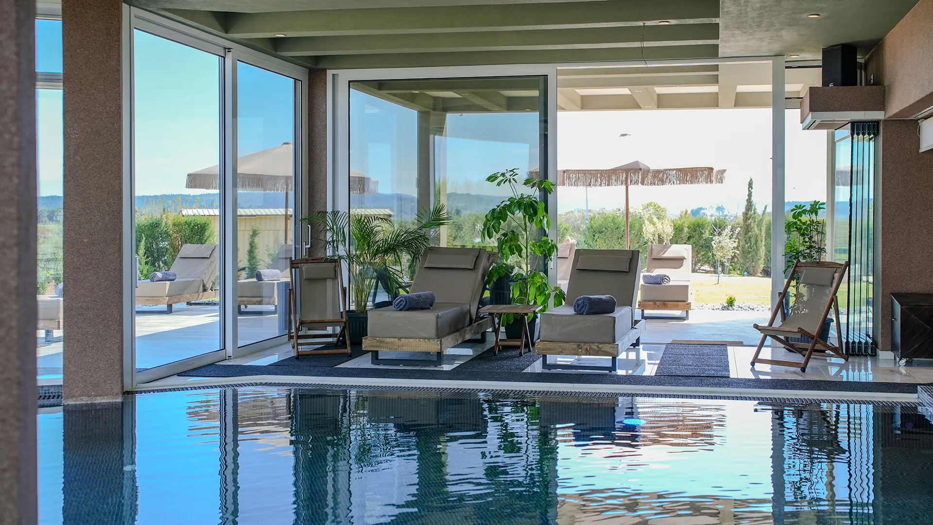 Tiara Holidays - GF Villas - indoor pool and sunbeds